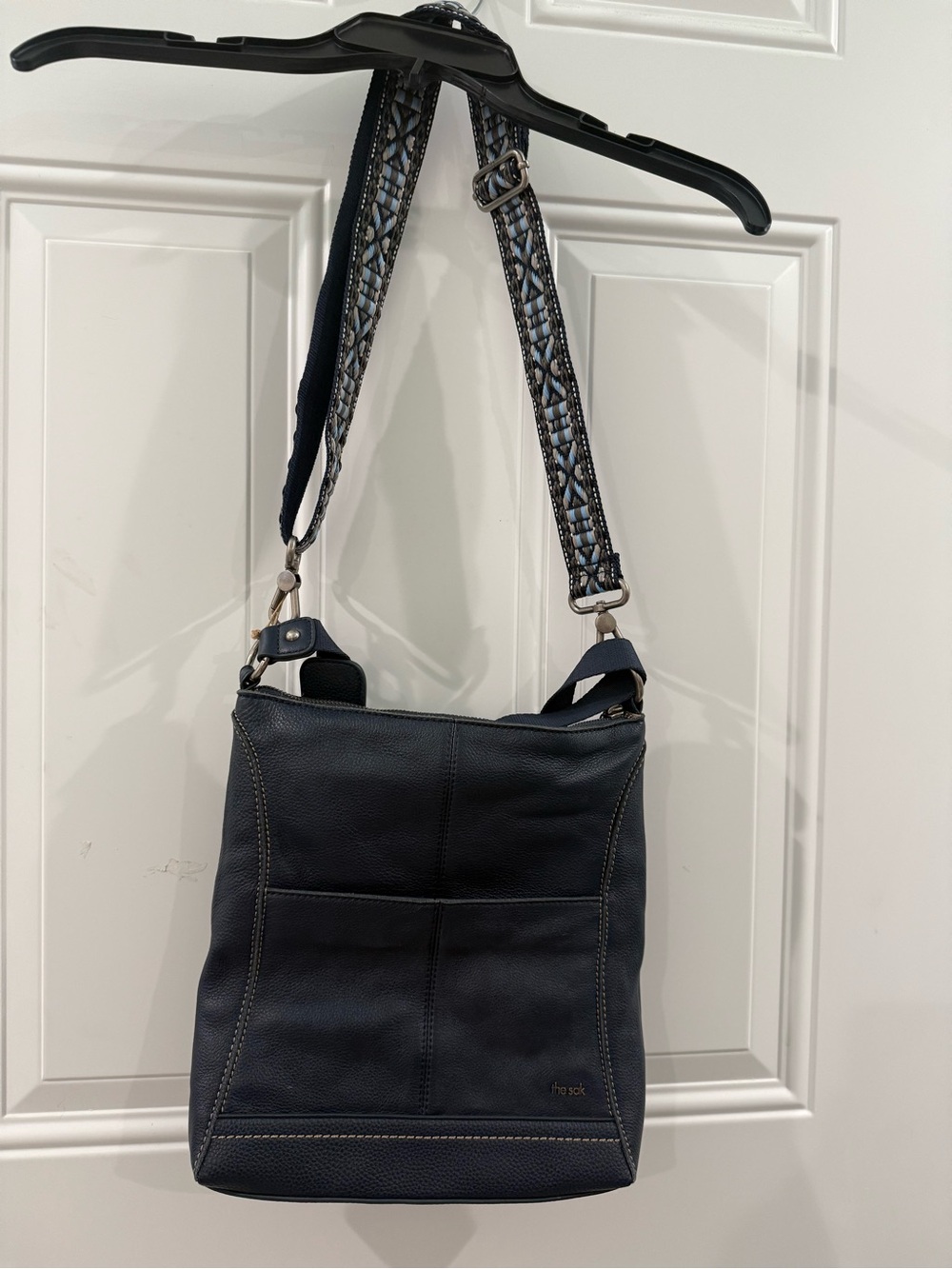 The Sak Navy Leather Crossbody with double Patterned Strap